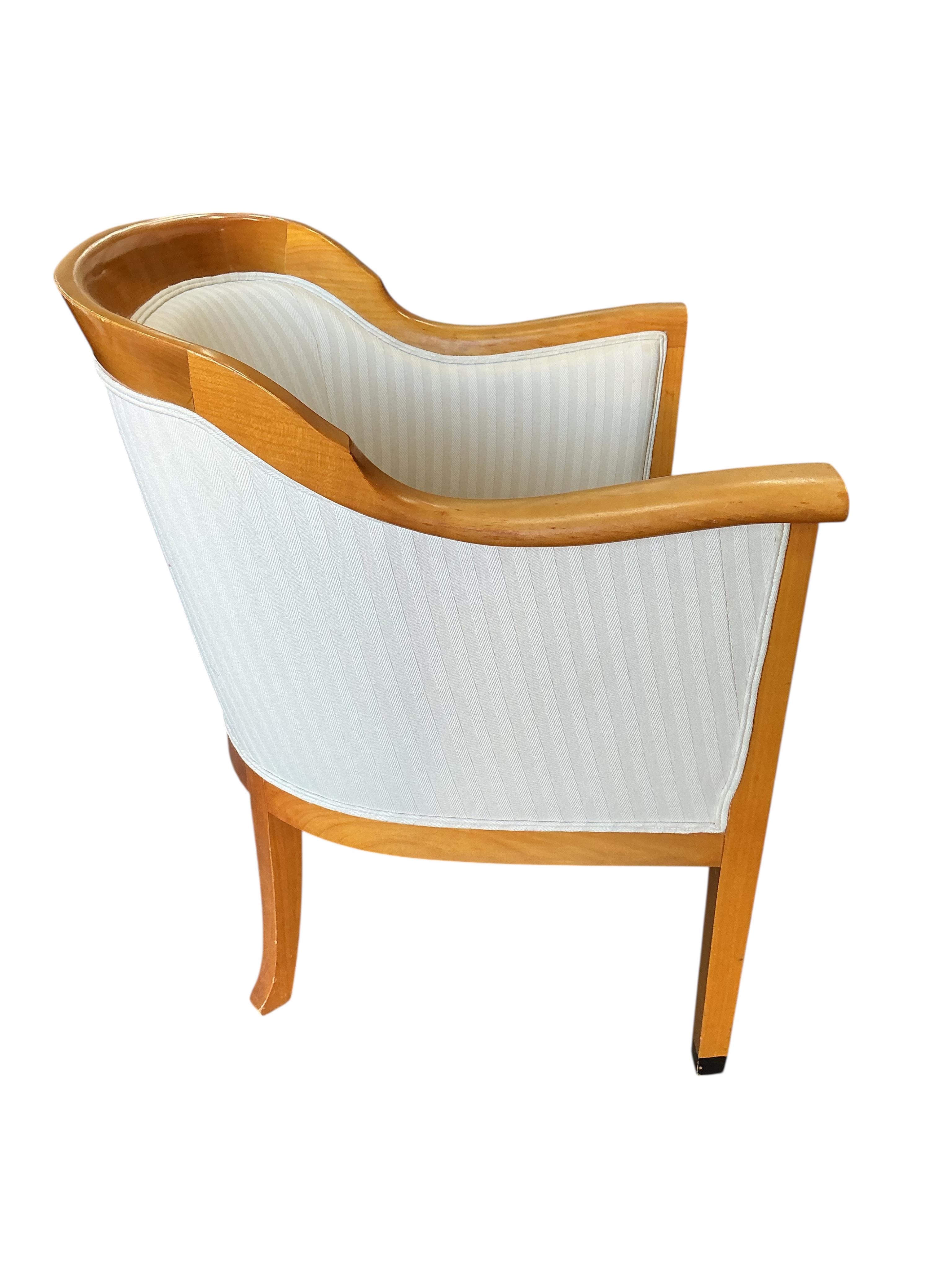 A pair of Contemporary OKA upholstered armchairs, width 69cm, depth 60cm, height 85cm